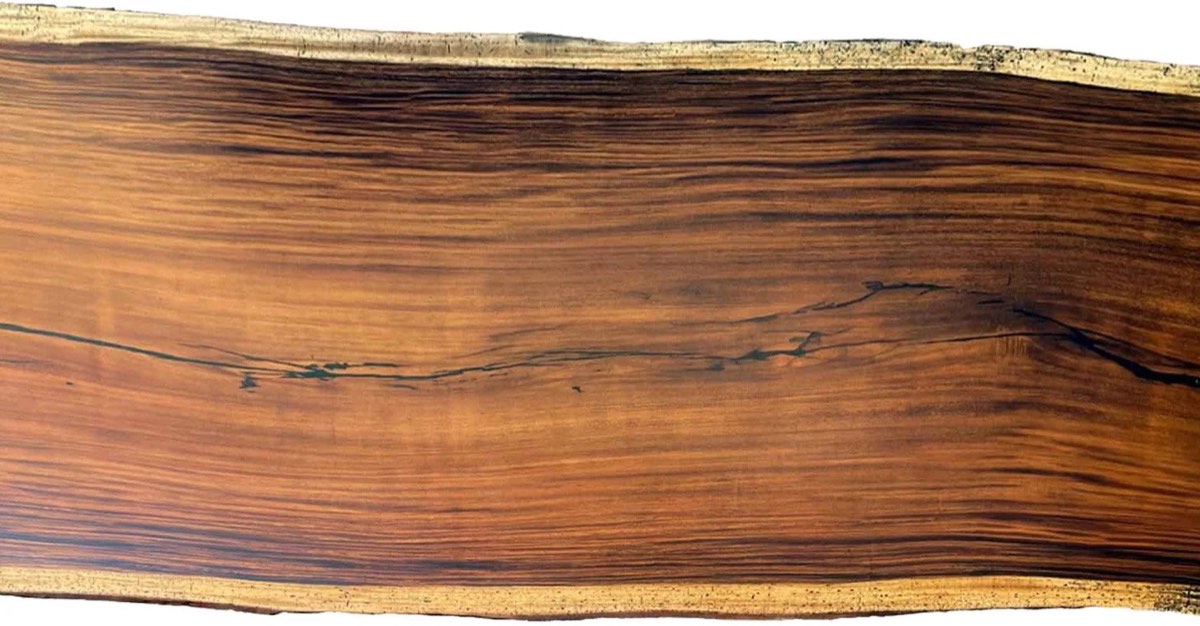 Costa Rican hardwood slabs stacked in the Bernardo Urbina workshop, Tilarán