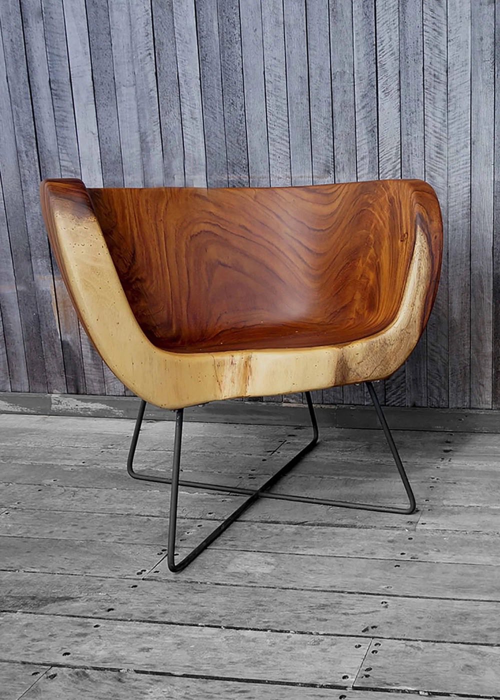 Pacífico sculptural chair carved from a single Guanacaste slab by Bernardo Urbina