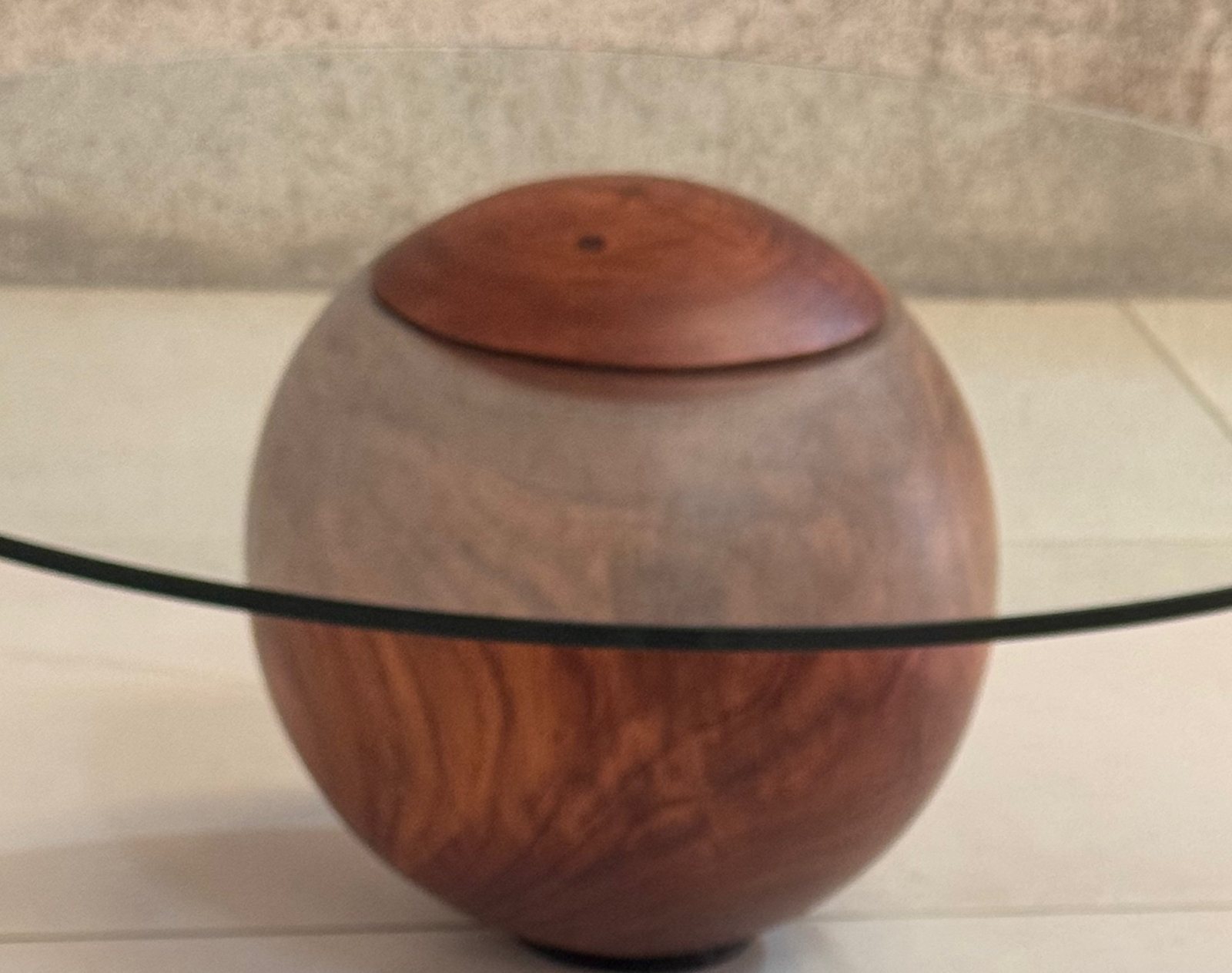 Sphere Coffee Table — turned hardwood sphere ringed by a clear glass top